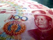 Čínský juan oslabil na nejnižší úroveň od roku 2007, může za to slabý růst i neshody s USA