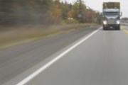 Dluhy PIIGS jako dálnice o 13 pruzích plná kamionů s prachama