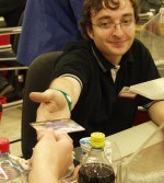 American Express propadl zisk o 72 %