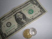 Dolar posílil s americkými daty, koruně se podařilo navýšit zisky