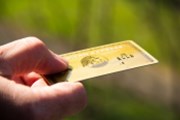 Vydavateli kreditních karet American Express prudce klesl zisk